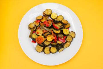 Grilled vegetables on white plate