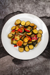 Grilled vegetables on white plate