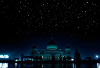 Obraz premium People walking in front of a mosque illuminated at night, showcasing its architectural details and serene atmosphere. Majestic mosque illuminated at night under a starry sky, showcasing architectural