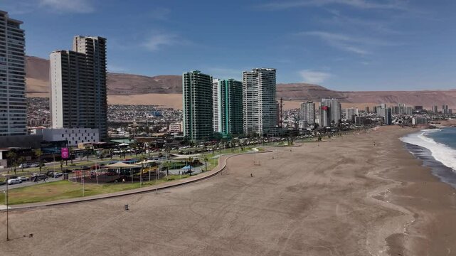 Iquique playa brava chile tarapaca cavancha day beach blue sky city