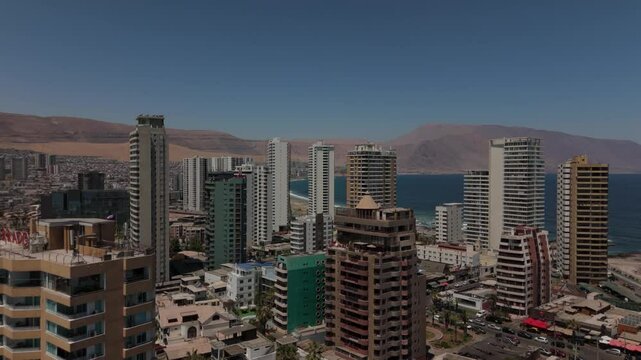 Iquique playa brava chile tarapaca cavancha day beach city buildings sea