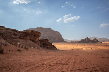 Wadi Rum Desert with Sandy Ground in Southern Jordan. Rocky Mountains in the Middle East. Asian Landscape during Sunny Afternoon.