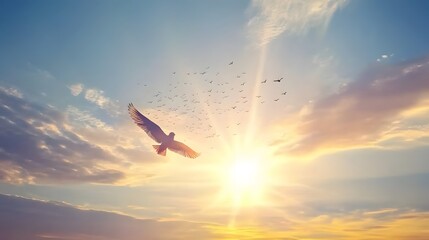 Obraz premium Majestic Bird Soaring at Sunset with Flock of Birds