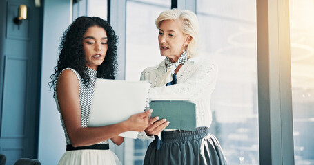 Women, talk and documents with tablet in office, finance and feedback with report at company....