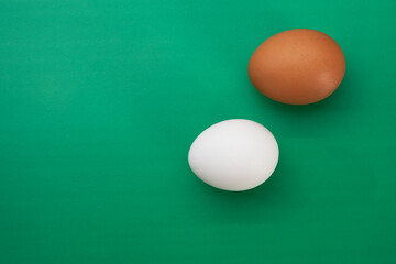 Egg crisis. Chicken eggs lie on a colored background