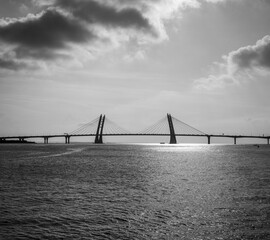 Black and White View of Bridge Across Strait — Global Urban Architecture Scene