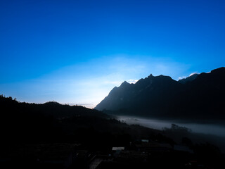 Doi Luang Chiang Dao: Misty Veil and Dawn's Embrace