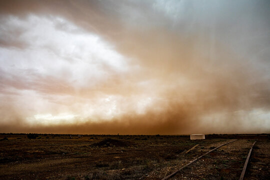 Dust storm rolling in from plains