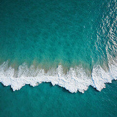 Aerial view beautiful of sea waves from drone. Stock image of blue color of ocean water, sea surface. Top view on turquoise waves, clear water surface texture.