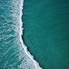 Aerial view beautiful of sea waves from drone. Stock image of blue color of ocean water, sea surface. Top view on turquoise waves, clear water surface texture.