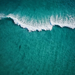 Aerial view beautiful of sea waves from drone. Stock image of blue color of ocean water, sea surface. Top view on turquoise waves, clear water surface texture.