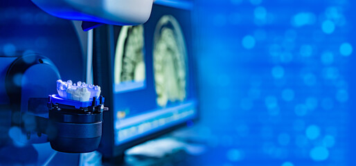 Workplace dental technician. Production of dental crowns. Milling dental system with computer...