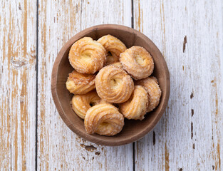 Samanta, typical brazilian sugar covered biscuit over wooden table