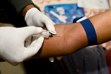 Blood sample collection in a medical laboratory setting