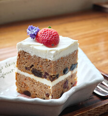 carrot cake on wooden  table