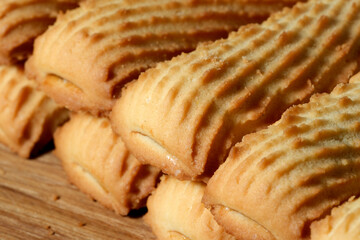 Deliciously golden baked cookies ready for enjoyment at tea time