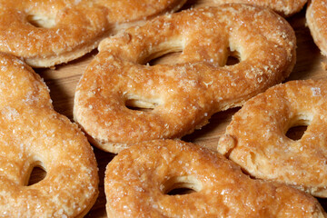 Delicious sweet pastries arranged on a rustic wooden surface