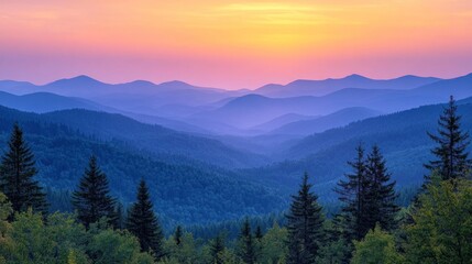 Naklejka premium Majestic sunset over layered blue mountains and evergreen trees.