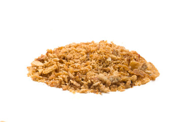 pieces of fried onions on a white background