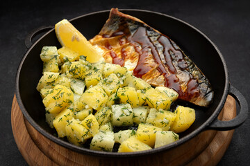 Grilled mackerel with potatoes and fresh herbs