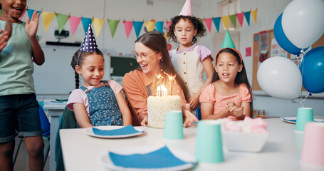 Children, teacher and birthday cake for celebration in classroom with singing, party or social...