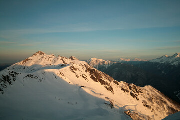 Snow-capped Caucasus Mountains at dawn, Sochi, Russia.