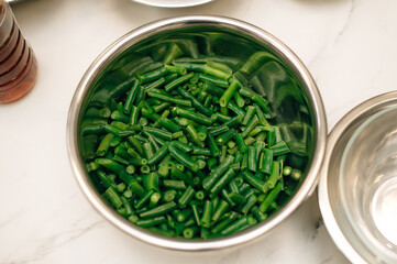 Green beans in a metal bowl