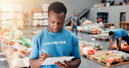 Volunteer, donation and checklist with man in warehouse for non profit, inventory clipboard and...