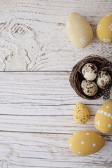 yellow easter eggs on rustic wooden background