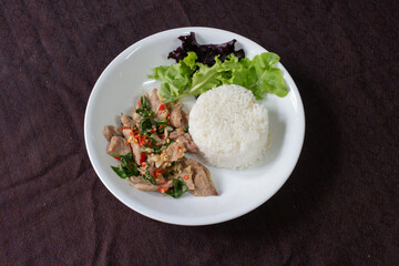 A plate of Stir-fried Beef with Holy Basil (