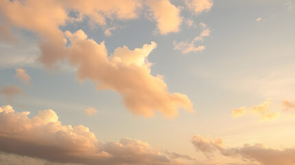 Obraz premium Soft pastel sky with light orange and blue clouds at twilight.