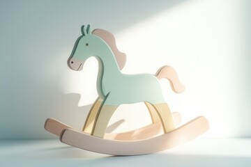 Pastel green wooden rocking horse toy, a charming addition to a nursery or playroom.
