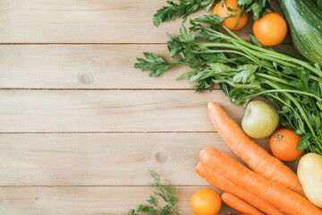 fresh assortment of colorful vegetables and fruits sprawled on rustic wooden table arranged in vivid and appealing