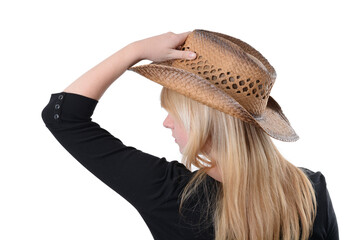 cowgirl holding her hat