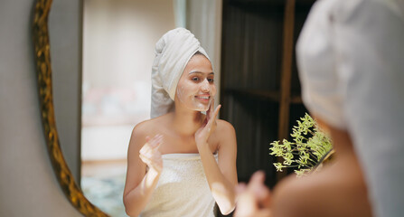 Indian young adult gen z woman lady teen girl female wrapped towel on head and body look mirror use...