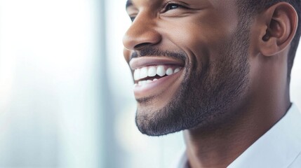 Obraz premium Confident businessman smiling in profile.