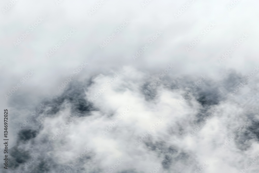 Poster the sky is covered in a thick layer of clouds, creating a moody