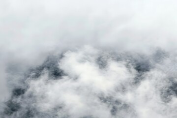 The sky is covered in a thick layer of clouds, creating a moody