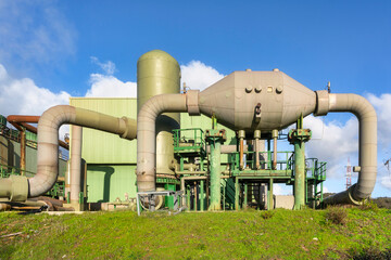 Geothermal energy. Pipelines of a plant in Larderello, Tuscany region, Italy