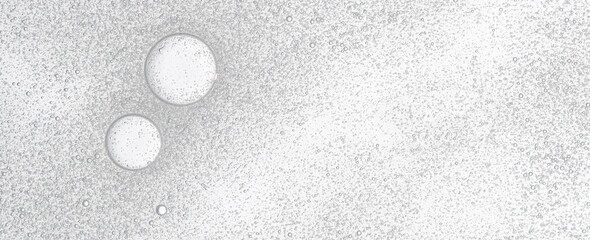 Textured background of cosmetic moisturizing gel or skin serum. Copy space