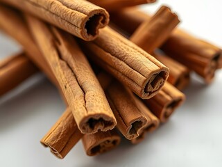Close-up of Fresh Cinnamon Sticks Aromatic Spice for Cooking and Baking, Isolated on White Background.