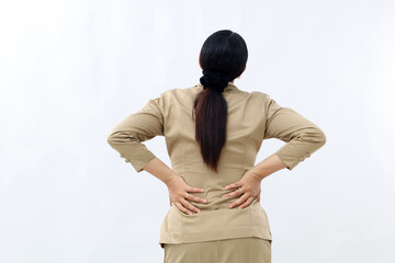 Back view of civil servant woman suffering from back pain.