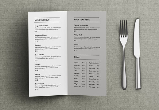 Bifold Restaurant Menu Mockup with Silverware on Table