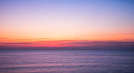 Soft pink and purple hues blending into the horizon as the sun rises over a calm ocean, AI Generated
