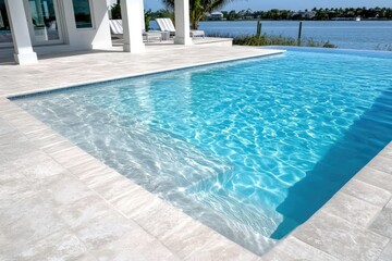 Luxurious pool, pristine water, modern design.  Tranquil oasis
