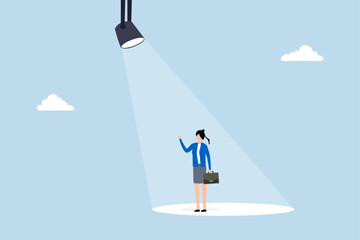 Obraz premium Woman in spotlight, exceptional entrepreneur standing in vivid spotlight. 