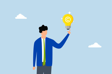 Copyright reserved, Entrepreneur with a light bulb concept featuring a copyright emblem. 