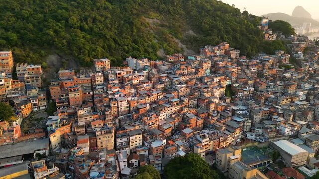 Aerial View of Cantagalo Slum and Copacabana District Below on Sunrise in Rio de Janeiro, Brazil