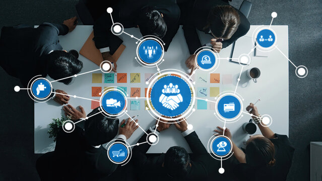 Top down aerial view of manager discuss and choose marketing idea from sticky notes. Group of business team talking and brainstorming strategy while making decision and choose plan. Directorate. Amity