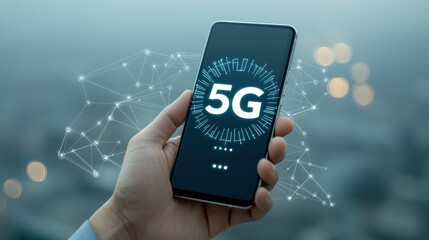 A hand holds a smartphone displaying "5G," symbolizing advanced mobile connectivity against a blurred urban backdrop.